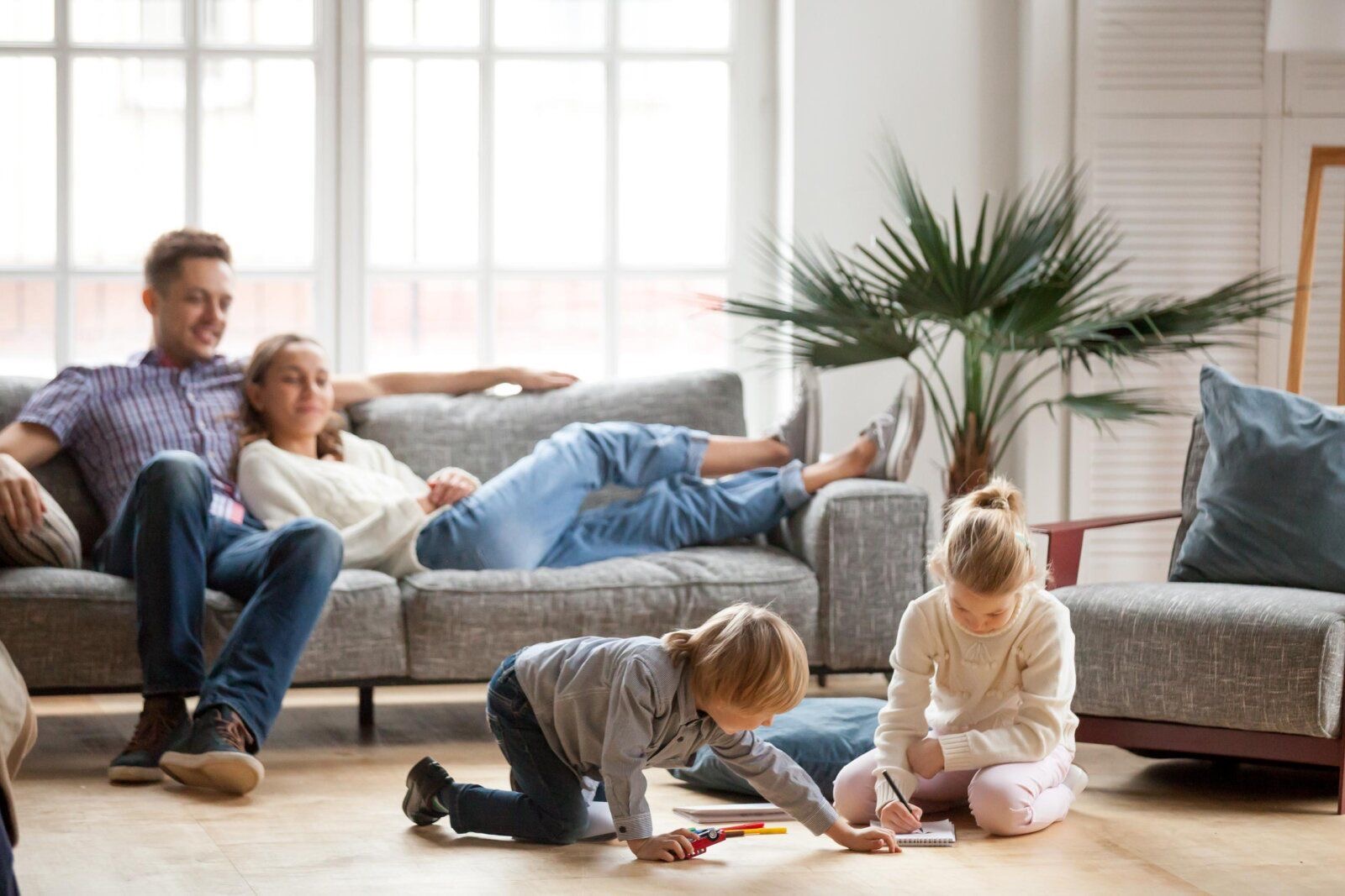 Happy family relaxing in a pest-free home in Pune